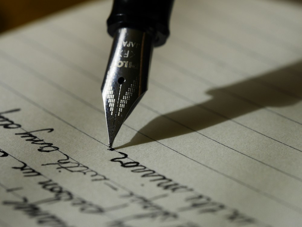 Writer shaping a story on paper